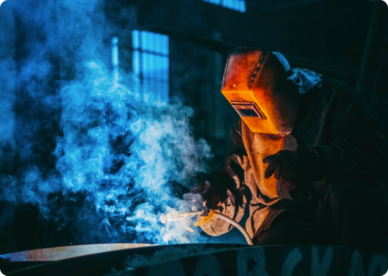 Person welding.